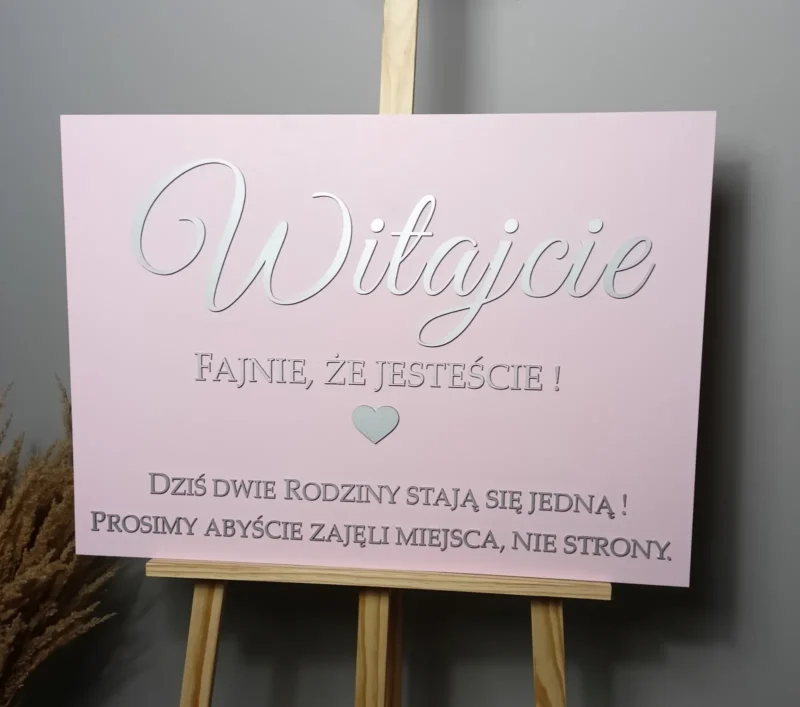 TABLICA POWITALNA PUDROWY RÓŻ "WITAJCIE... DZIŚ DWIE RODZINY STAJĄ SIĘ JEDNĄ... " SREBRNE NAPISY - DEKORACJE WESELNE - M242